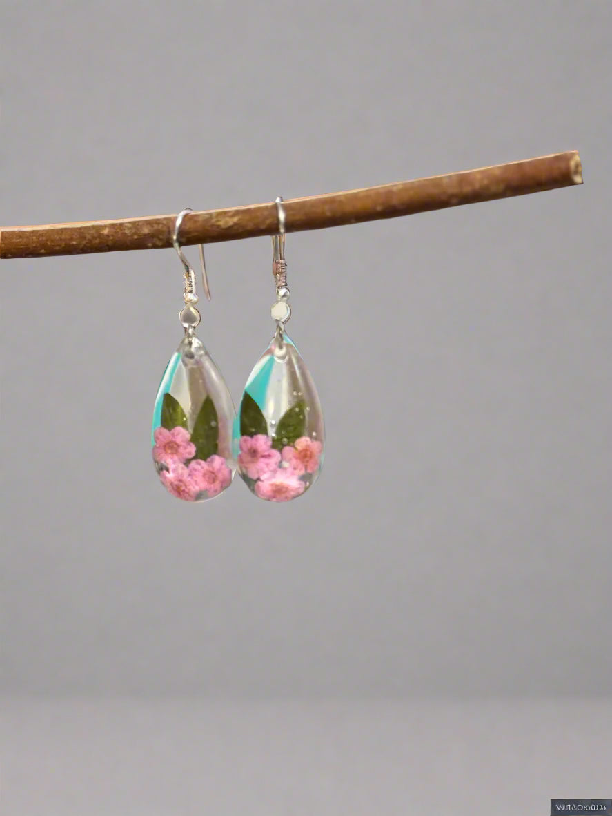 Resin Art Teardrop Earrings with Real Pink Forget me Nots. With 925 Sterling Silver Plated Hooks