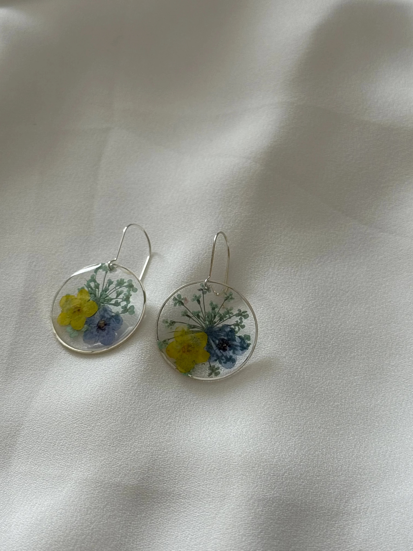 Resin Art Earrings Made With Real Blue and Yellow Forget me Nots. With 925 Sterling Silver Plated Hooks
