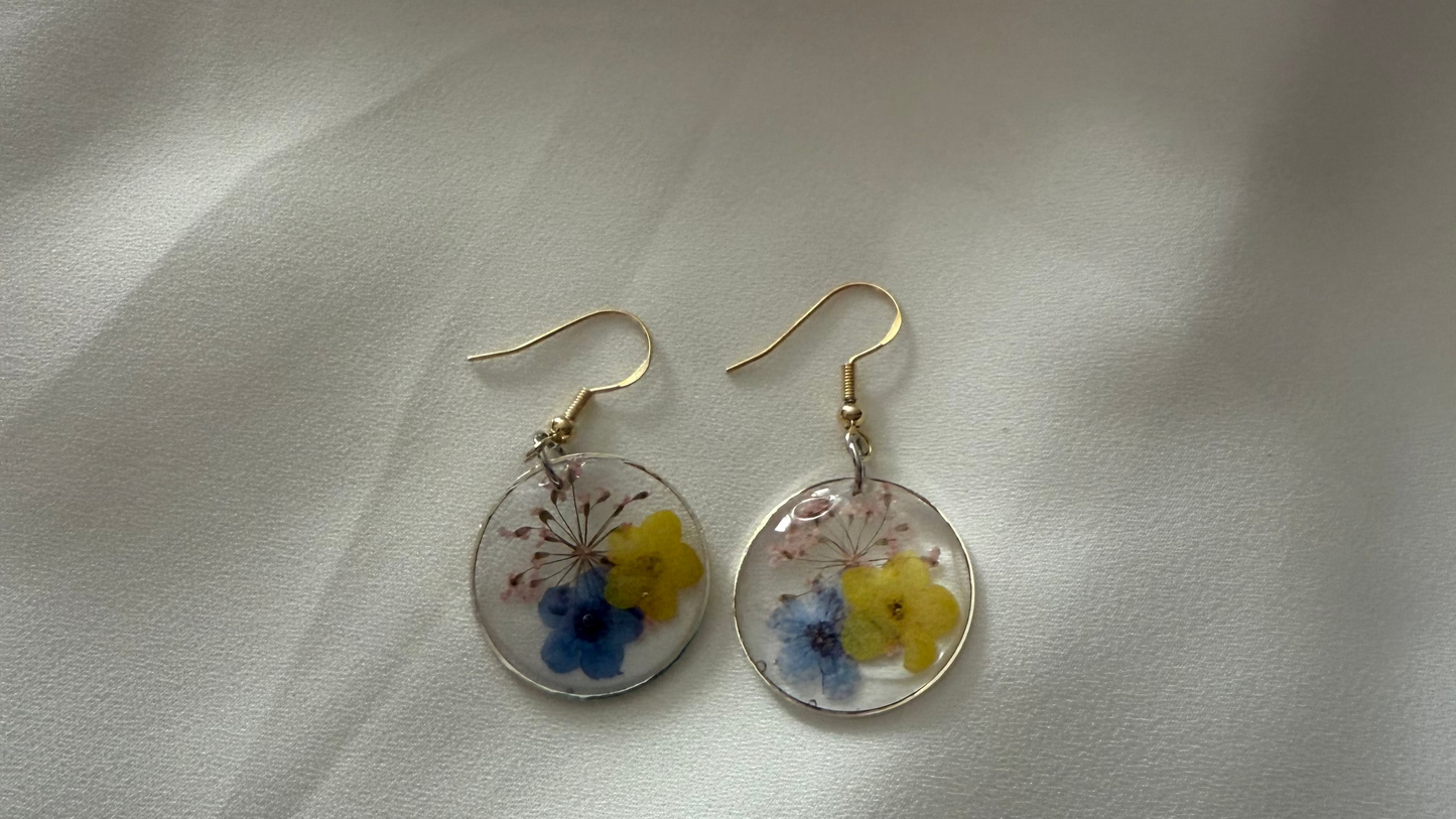 Resin Art Earrings Made With Real Blue and Yellow Forget me Nots. With 925 Sterling Silver Plated Hooks
